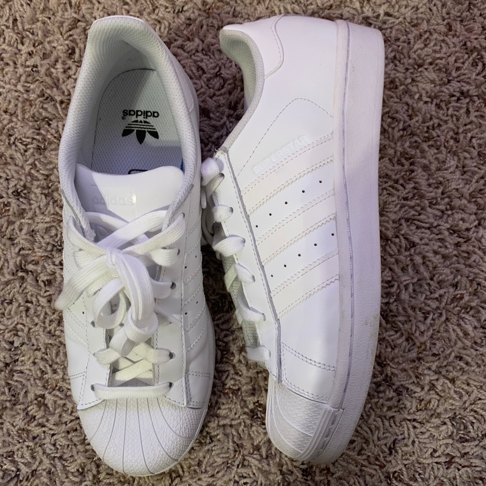 White Adidas Superstars